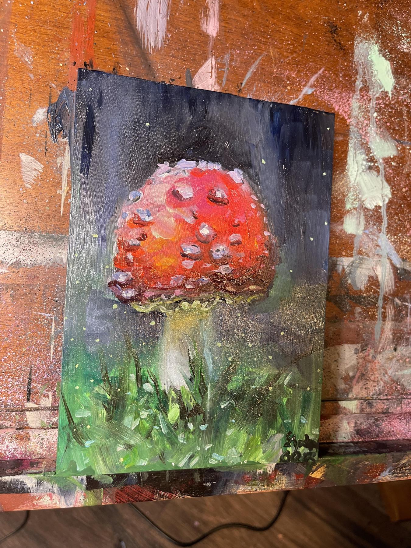 A painting of a fly amanita mushroom.