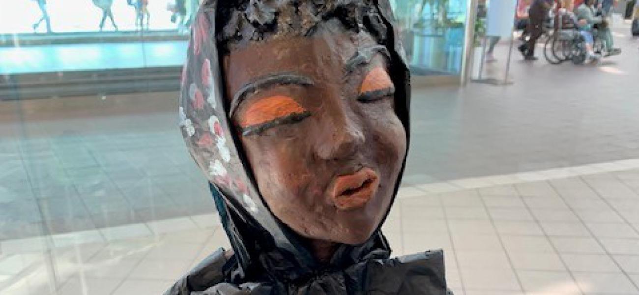 imberly Harris-Watkins, new to the airport workforce, entered artworks by several family members including her own delicate papier-mâché sculpture titled “Survivor” (pictured here)