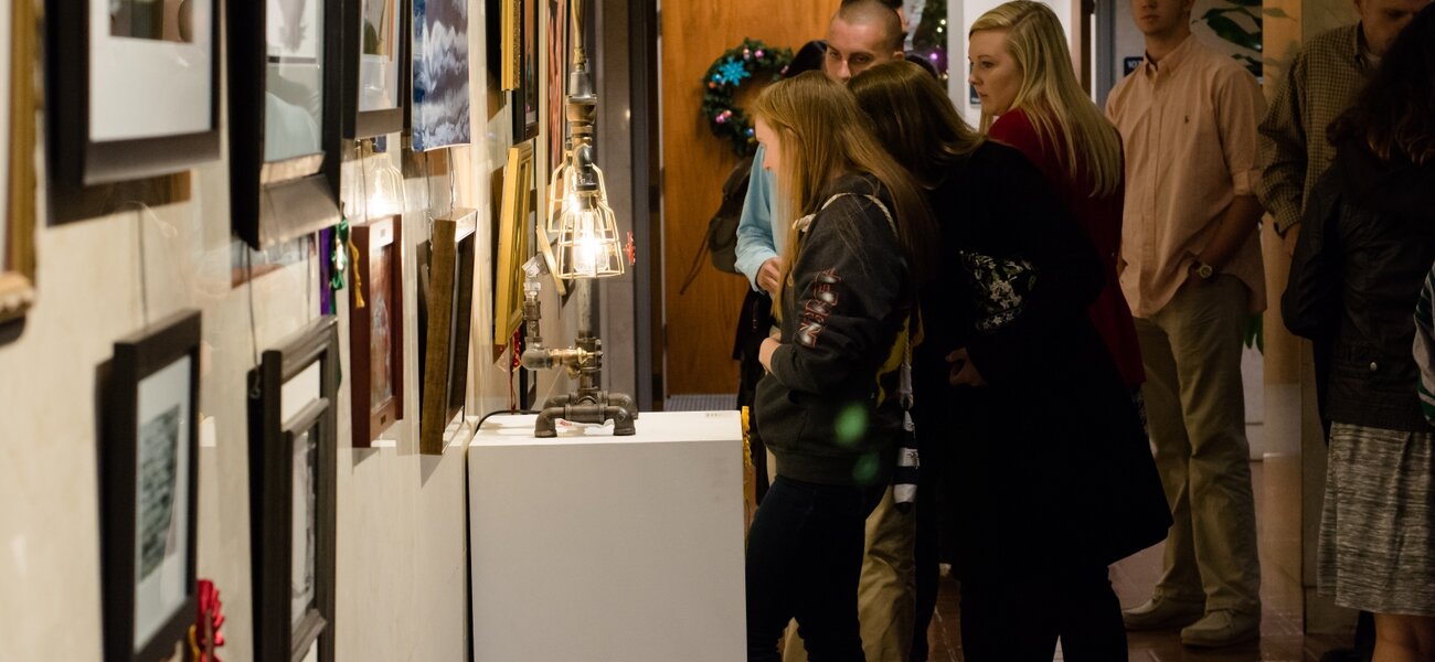 14th Annual Exhibit Visitors taking in the artwork on display at the Block Gallery during the awards reception for Raleigh / Wake County NAP Exhibit