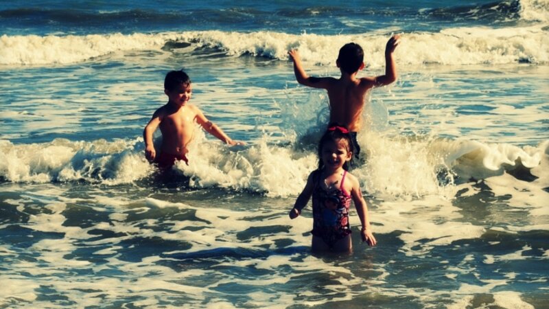 Children at the beach playing