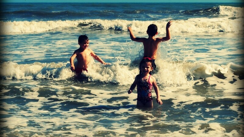 Children at the beach playing