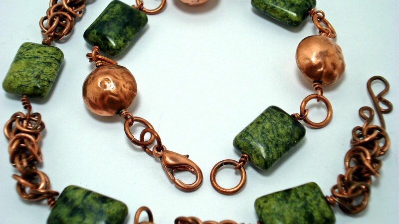 2 bracelets - repousee beads and chryospace gem beads