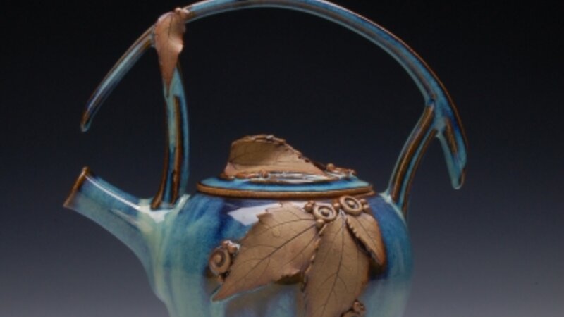 Teapot with meditation rattle