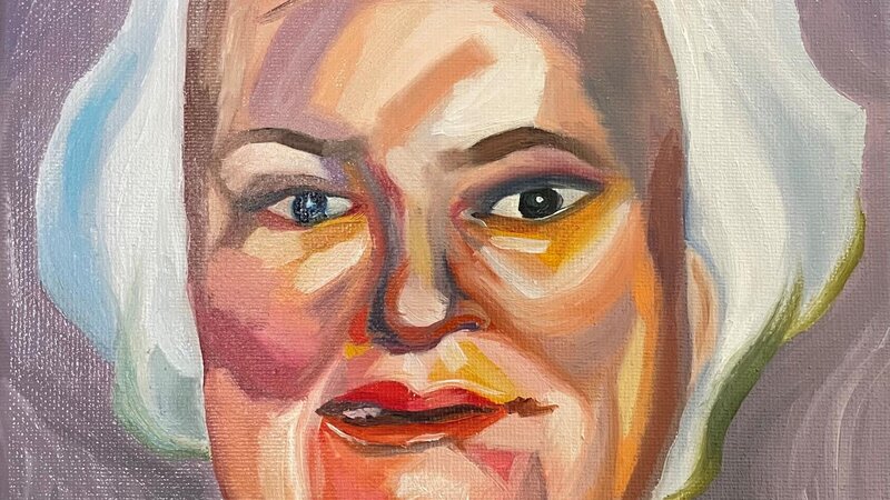 Loose saturated portrait of old woman sporting a white bob and pearls