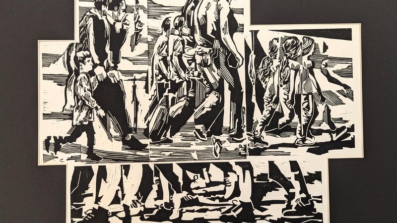 Block print of people walking