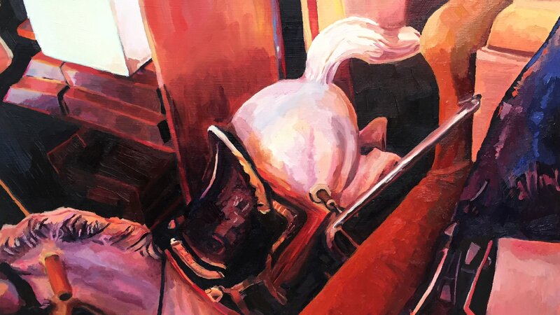 A cluttered basement with a white rocking horse thrown in the corner. The light is setting through a basement window. 