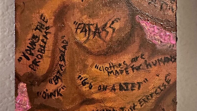 A beautiful fat black women's body being defiled by social media and society's fat phobic slurs and comments. 