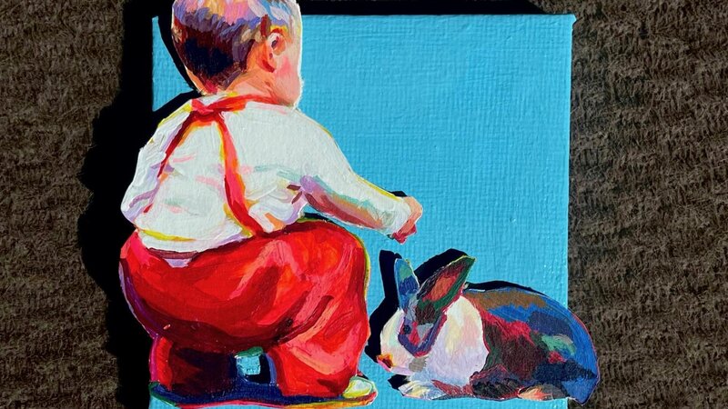 A little boy in red overalls going to pet a bunny. His back is towards us. The figure and bunny are on a separate surface than the canvas and are hanging over the edges. 