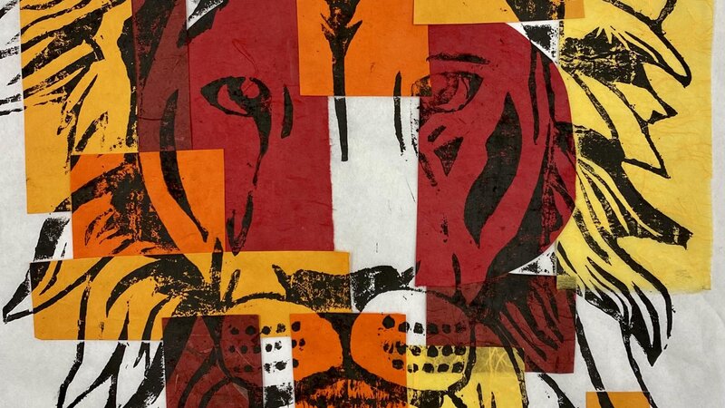 Japanese Style WoodBlock Carving of a Lion profile printed with black ink on sheet of rice paper with pieces of warm colored paper on top.