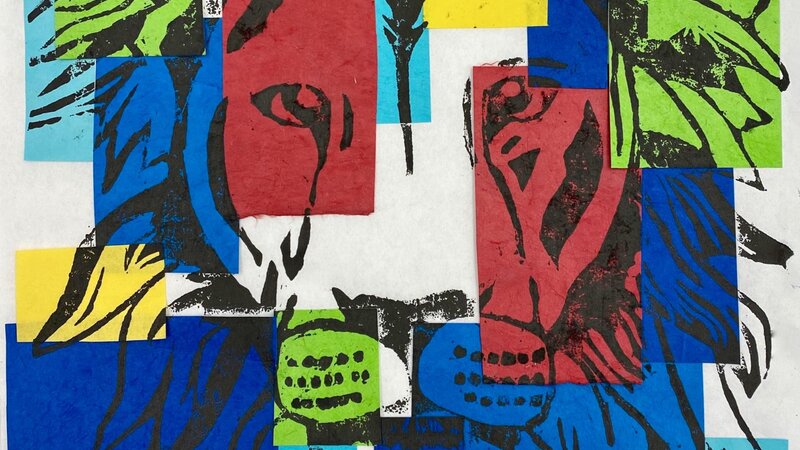 Japanese Style WoodBlock Carving of a Lion profile printed with black ink on sheet of rice paper with pieces of cool and warm colored paper on top.