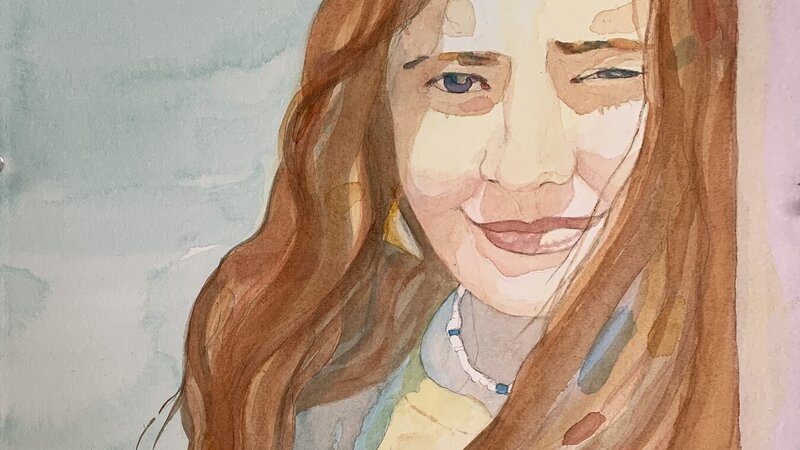 Portrait of a girl in bright sunlight