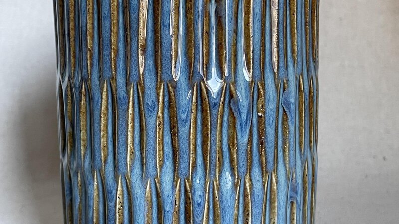 Carved ceramic vessel