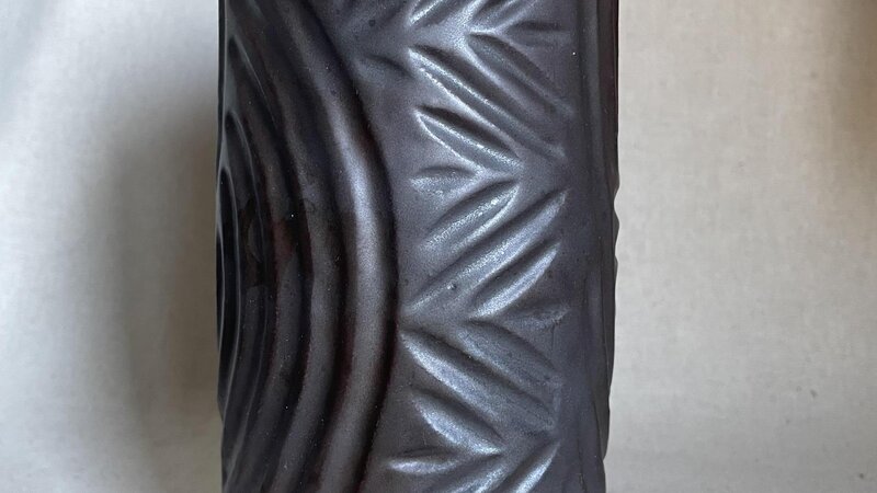 Carved ceramic vase. 