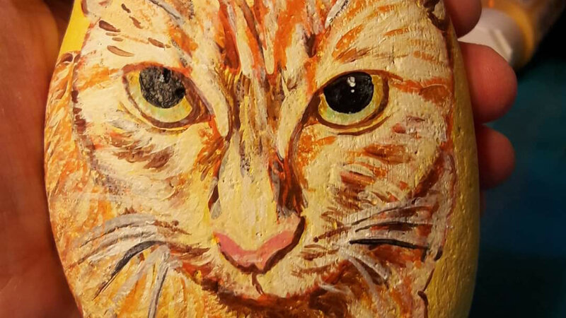 Painting of my orange female tabby on rock.
