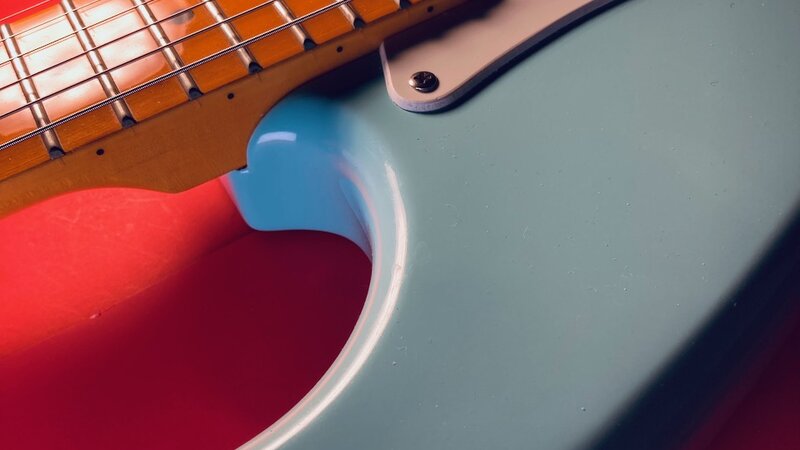 Photo of Stratocaster style electric guitar, July 2024