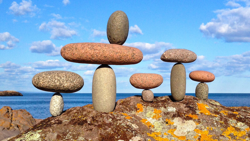 A family of five balanced rock sculptures
