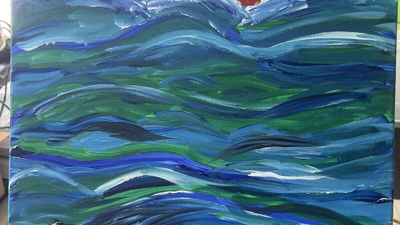 Wild waves with an orange red sky