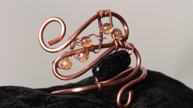 Wrapped wire and beads. Original designs .