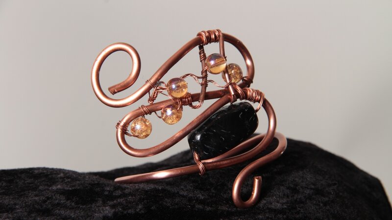 Wrapped wire and beads. Original designs .