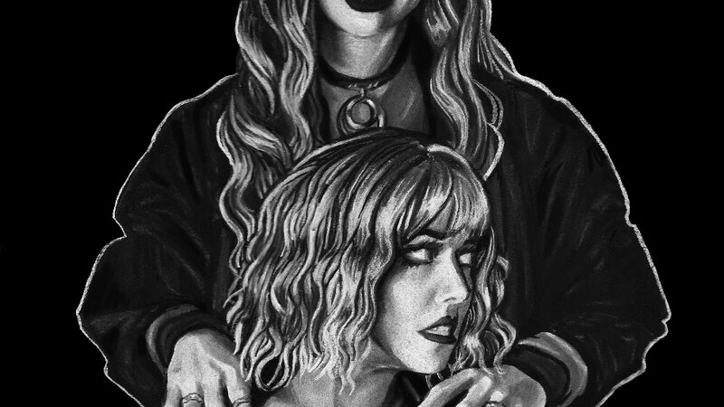 Black and white charcoal drawing of two girls, one standing behind the other. The girl in the front has shoulder length wavy hair and leather jacket. The girl in the back has her hands resting on the girl in the front and has long curly hair. Both girls have a goth/alternative fashion and attitude to them. 