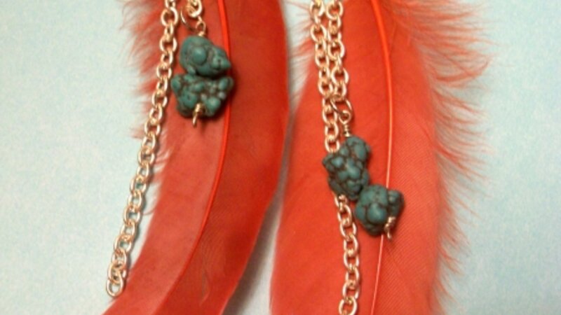 Red feather earrings