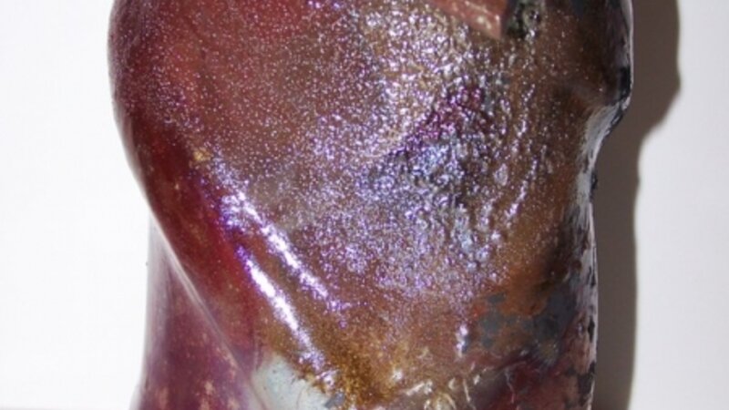 Copper glazed twist shaped vase