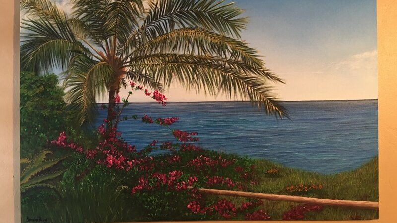 Maui palm tree with ocean in background 