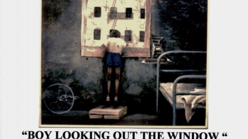 BOY LOOKING OUT THE WINDOW