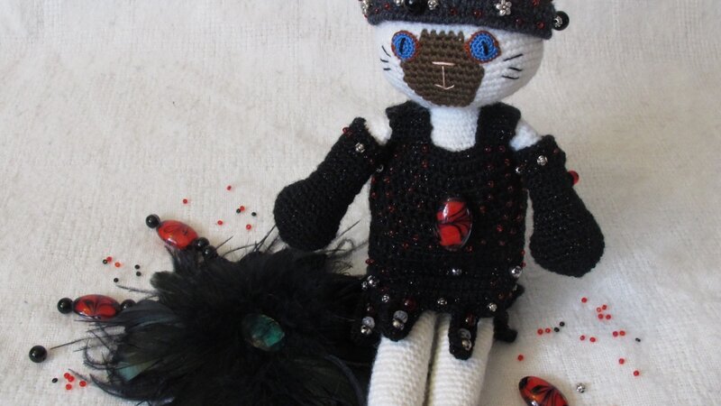 Dahlia; rcohet doll; chocolate point Siamese cat in Roaring 20s themed outfit