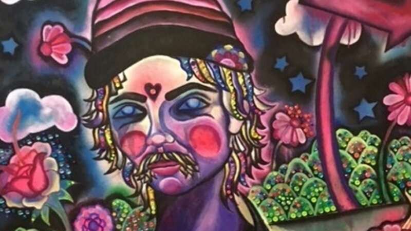 Man In A Field of Flowers and Arrows