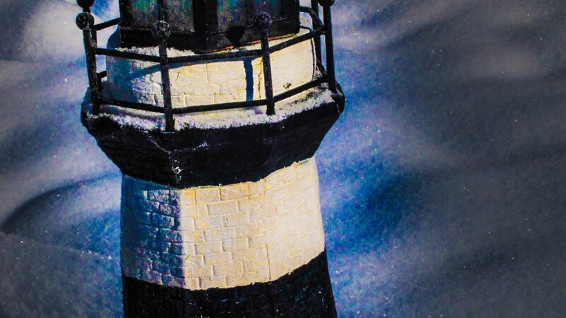 lighthouse in April snow