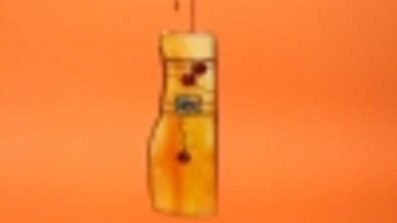 Glass suncatcher with embellishments