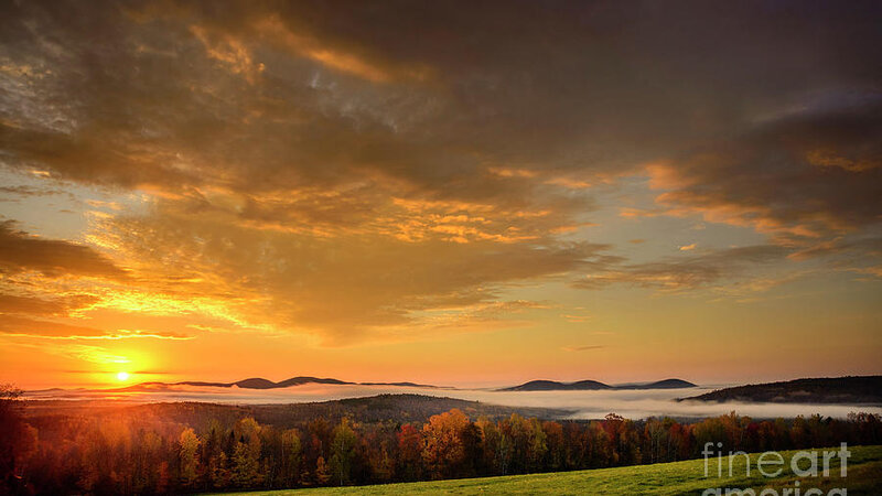 October Sunrise is a view from Phillips, Maine