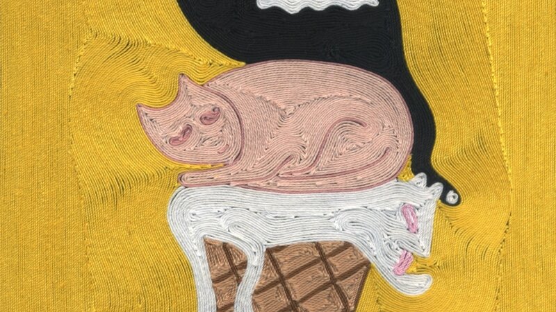 Three cats on top of an ice cream cone, as if scoops of ice cream