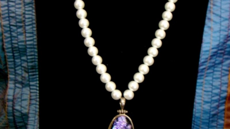 pearls and funky glass baby