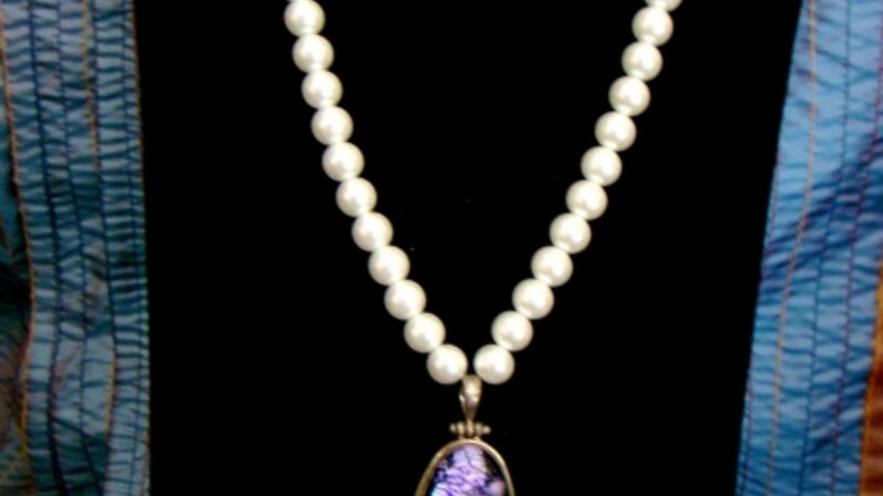 pearls and funky glass baby