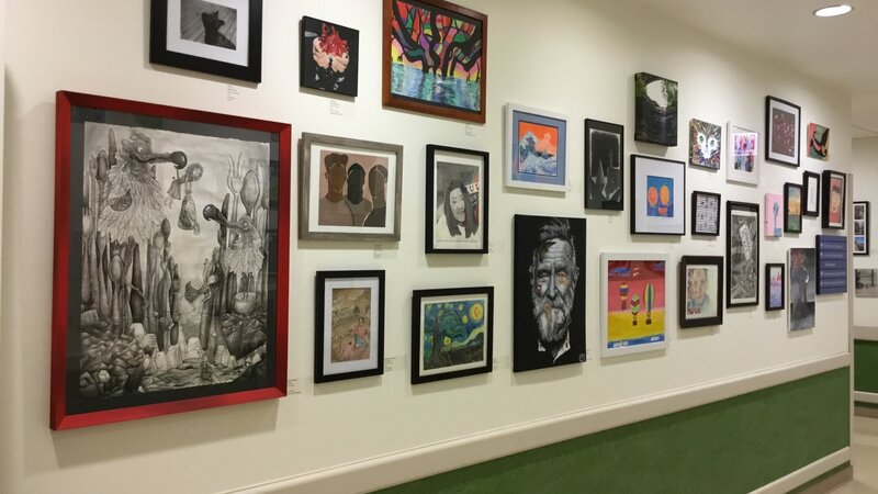 7th Annual Exhibit Wall filled with artwork from the 7th Annual NAP Exhibit