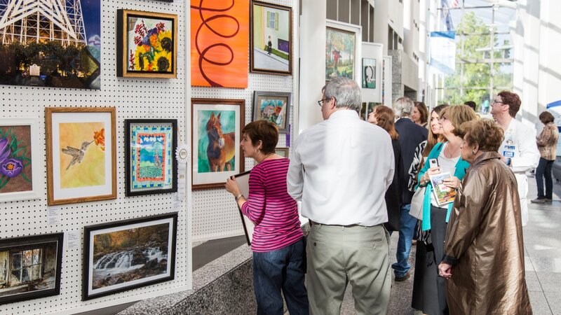 3rd Annual Exhibit Attendees viewing the artwork on display at Carilion Clinic during their awards reception.