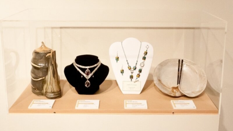 2nd Annual Exhibit Display case featuring three dimensional pieces 