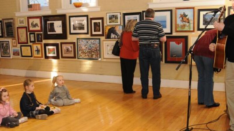 3rd Annual Exhibit 2010 NAP Reception Guests Take in the Show