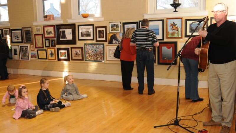 3rd Annual Exhibit 2010 NAP Reception Guests Take in the Show