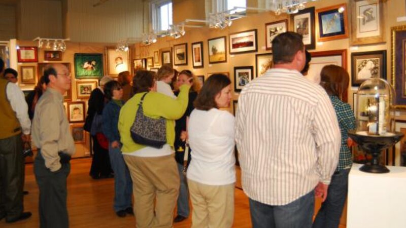 2nd Annual Exhibit People taking in the art at the awards reception.