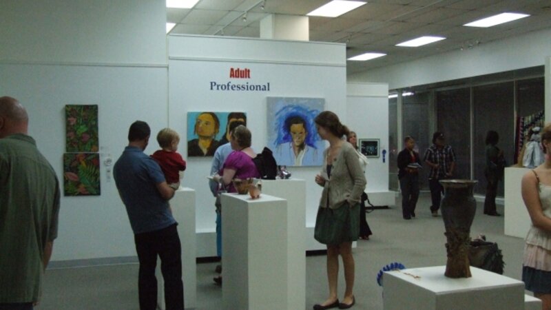 5th Annual Exhibit Attendees taking in the artwork at Opening Reception of the 5th Annual NAP Exhibition in Savannah, GA
