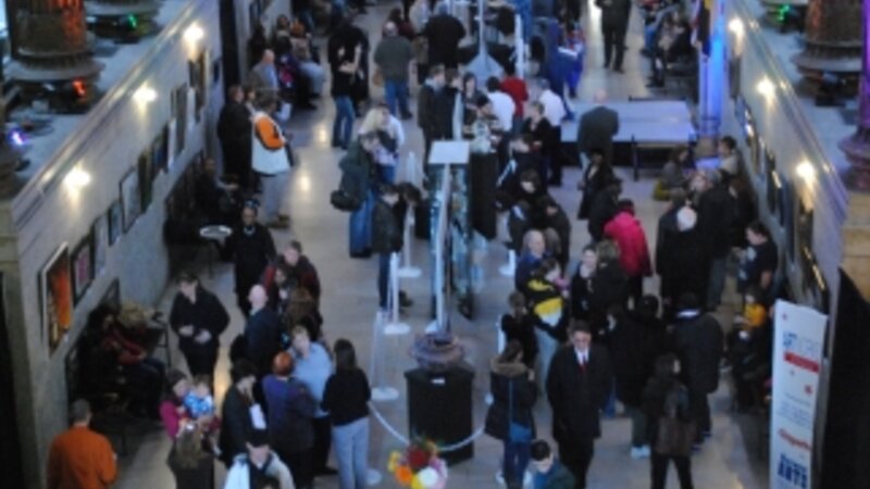 12th Annual Exhibit Attendees taking in the artwork on display at the City-County Buidling during the awards reception