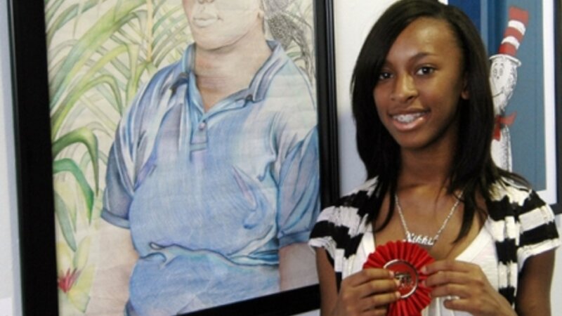 5th Annual Exhibit Girl In Blue Shirt
