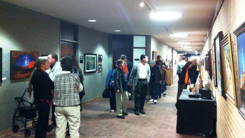 7th Annual Exhibit Visitors to the Salt Lake County Government Center taking in the artwork on display by employees and their family members
