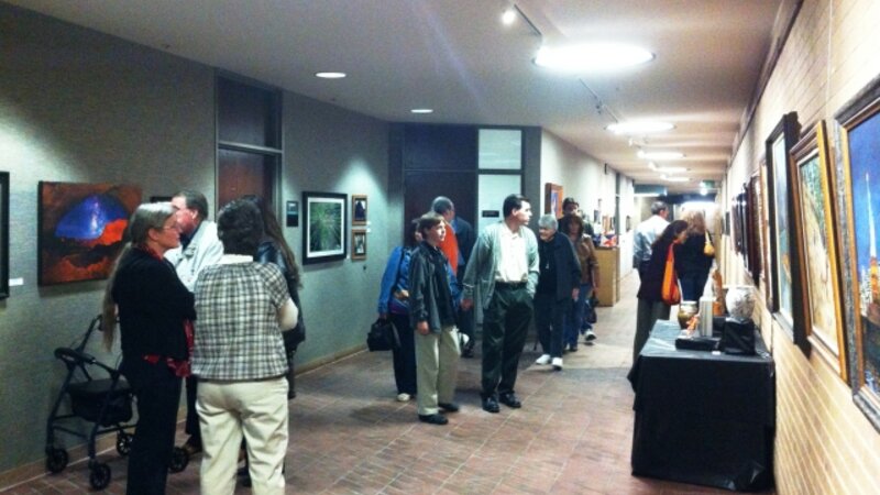 7th Annual Exhibit Visitors to the Salt Lake County Government Center taking in the artwork on display by employees and their family members