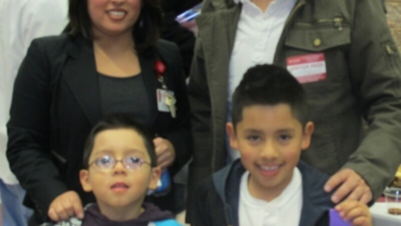 1st Annual Exhibit Sebastian Luna Pictured with His Family.