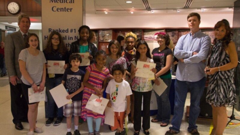 7th Annual Exhibit Youth & teen winners pose with Joseph A. Trunfio, President & CEO and Maria Lupo, Venue Coordiantor during the awards reception.