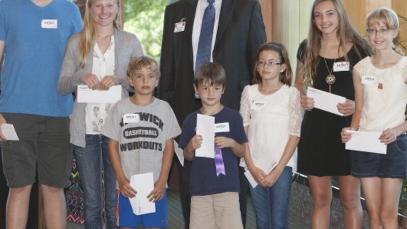 4th Annual Exhibit Regional President & CEO, Dr. Kapaska with Continuing Art Education Scholarship winners at the awards reception.